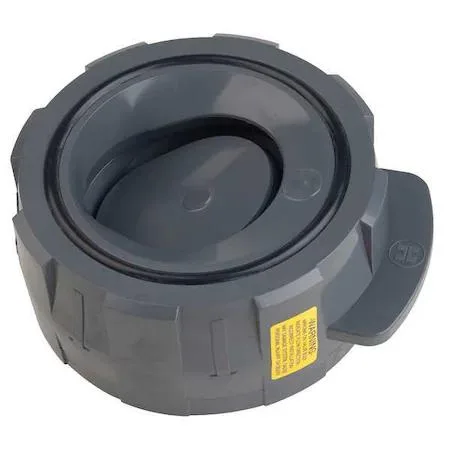 White PVC wafer check valve with stainless steel spring visible inside flange connection