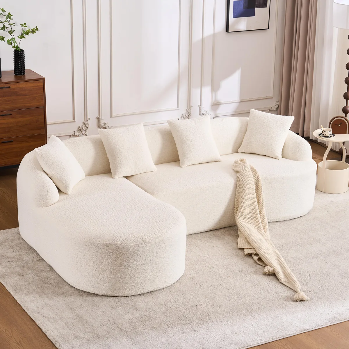 White L-shaped sectional with curved chaise and chenille finish