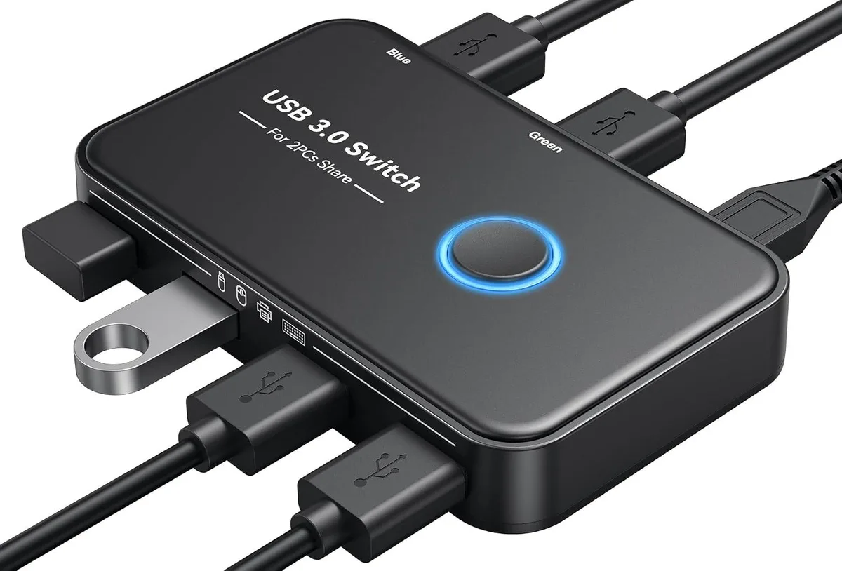 Compact black USB 3.0 KVM switch with toggle button and LED indicators