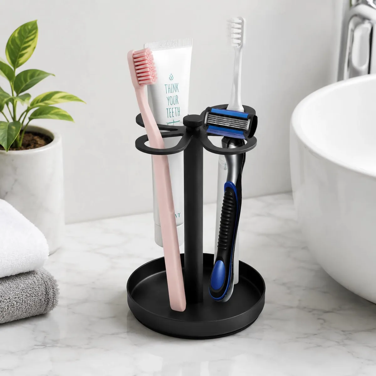 Black Stainless Steel Toothbrush Holder with Diatomaceous Earth Base, 4 Ventilated Slots — product photo