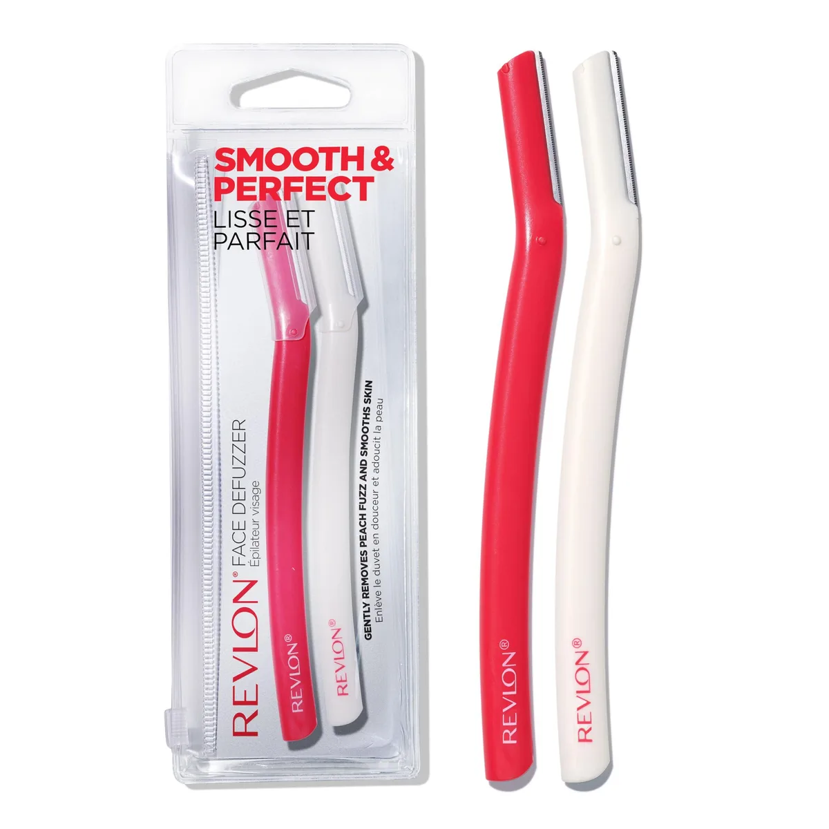 Two peach dermaplaning tools with stainless steel blades
