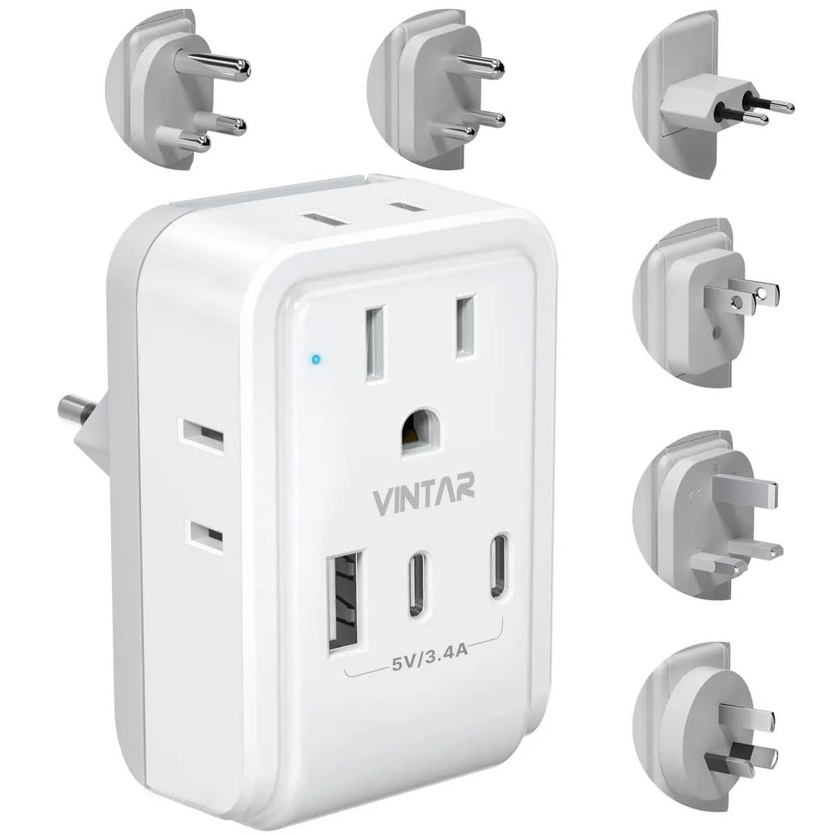 White and grey travel adapter kit with six detachable plugs and storage bag