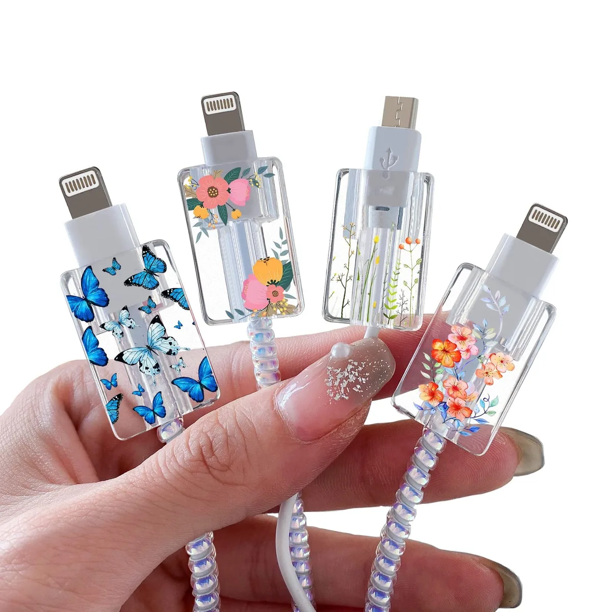 Four black metal cable protectors with floral patterns, each 1.0922 cm by 9.7028 cm by 11.5062 cm, weighing 0.009 kg