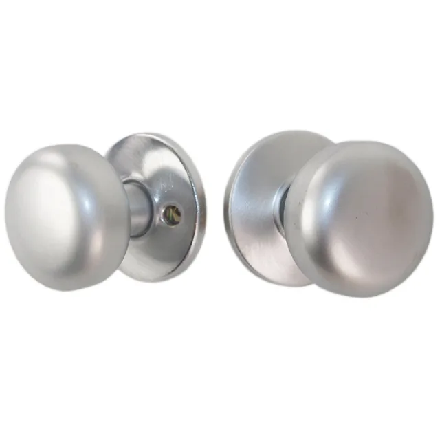 Pair of round satin chrome door knobs with roses, thru-bolted mounting