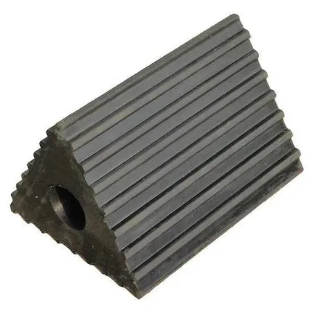 Black rubber wheel chock with grooved tread surface and molded hole, rectangular block form factor, matte finish