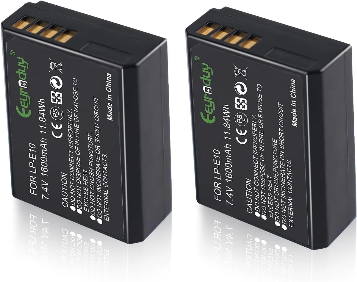 Two rectangular black lithium-ion camera batteries with gold contacts side by side
