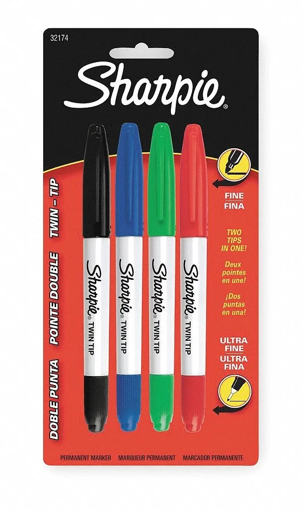 Four capped Sharpie twin-tip markers in black blue green red