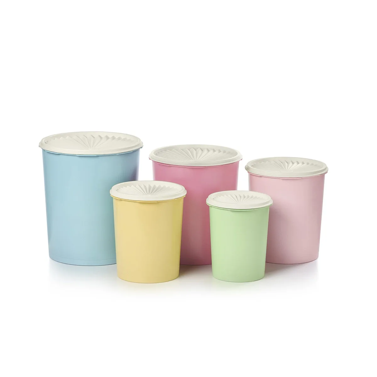 Five nesting canisters with matching sunburst lids in red