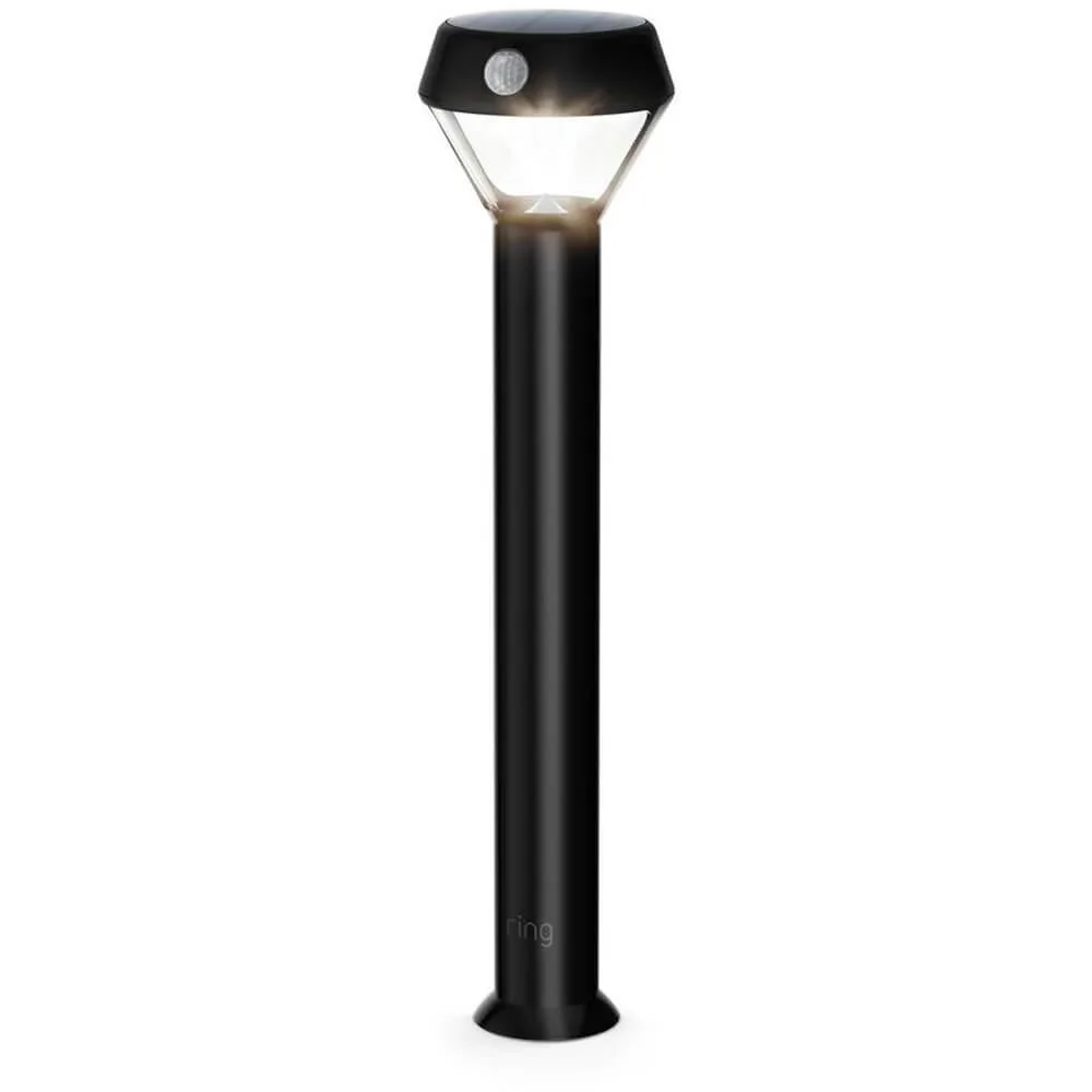 Black cylindrical solar path light with flat top panel and motion sensor