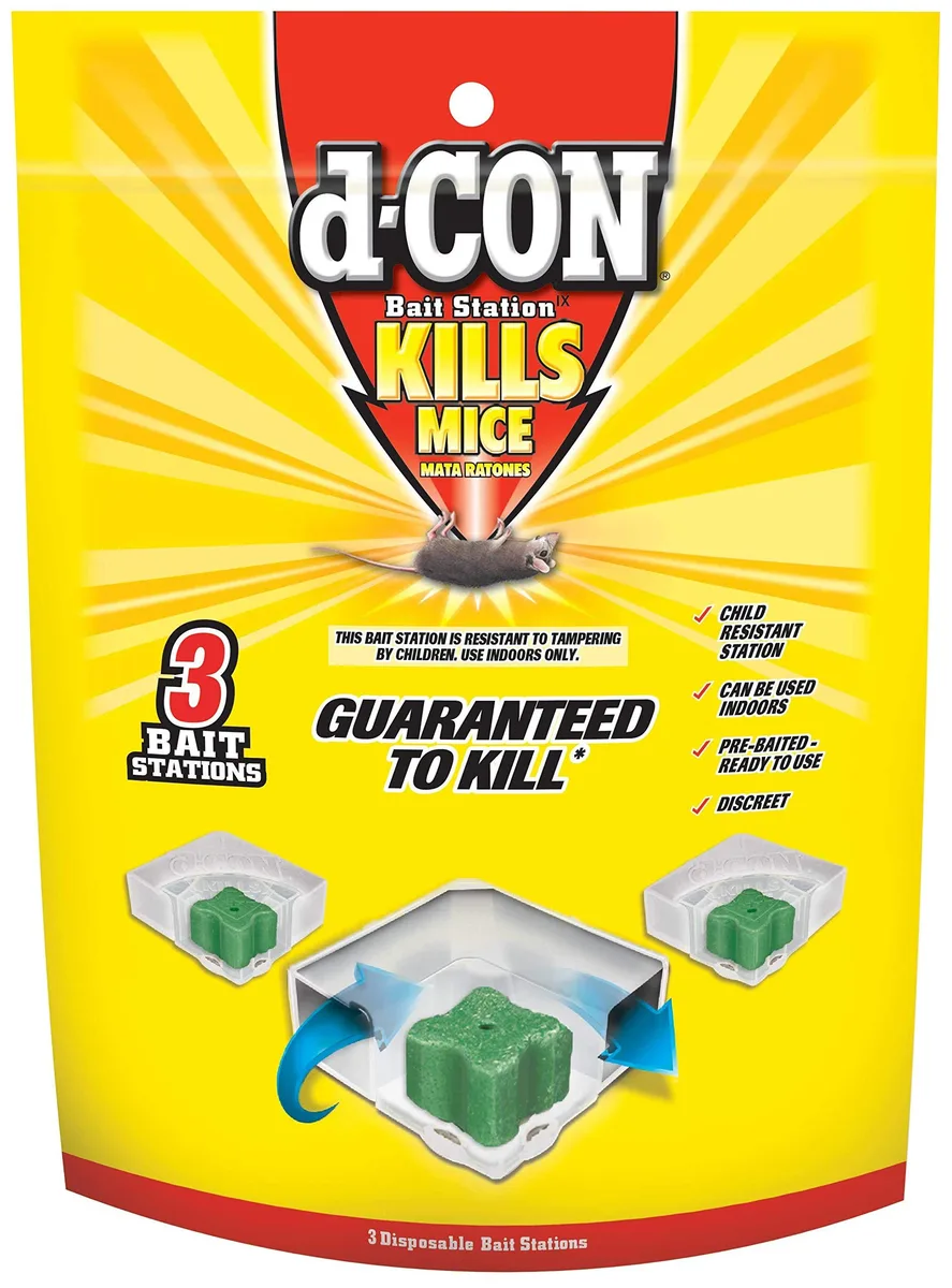 Three small rectangular plastic bait stations in corner-fit design