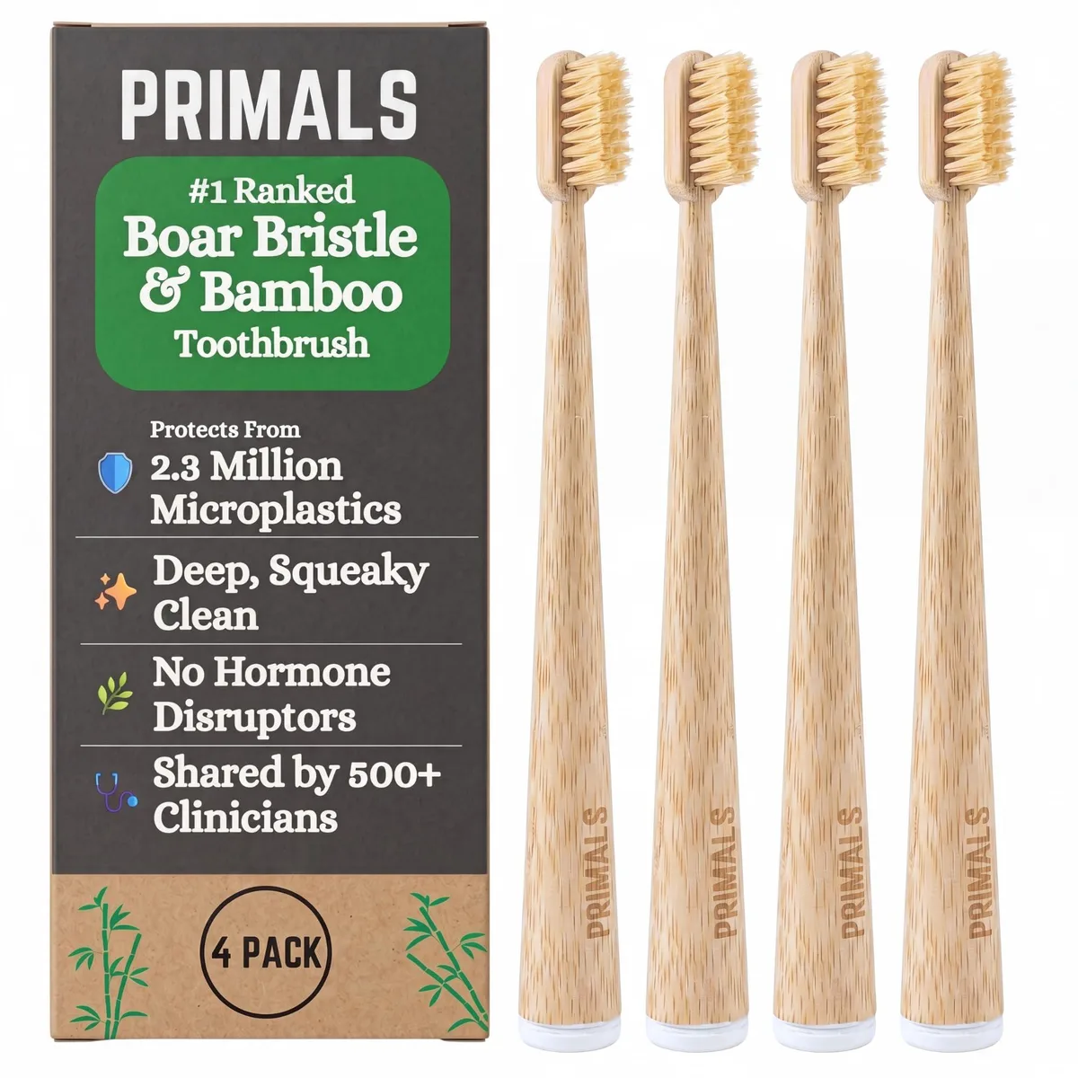 Four bamboo toothbrushes with natural bristles on cardboard