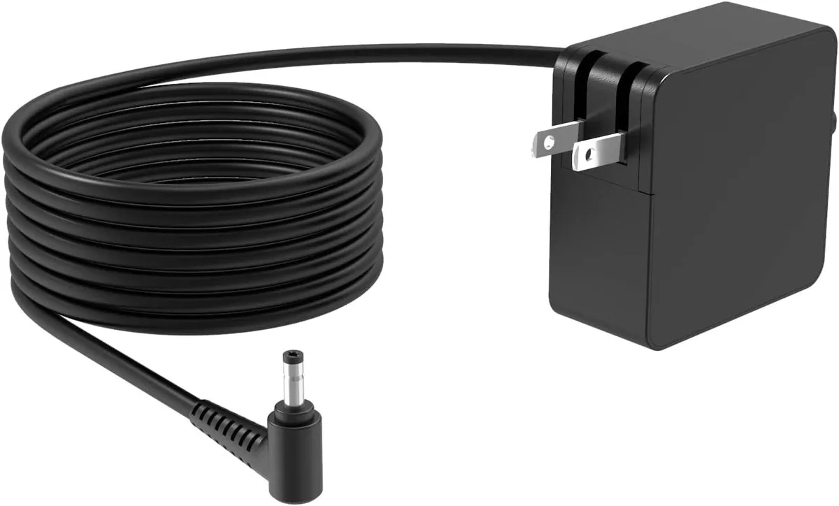 Compact black 45W laptop power adapter with round tip connector