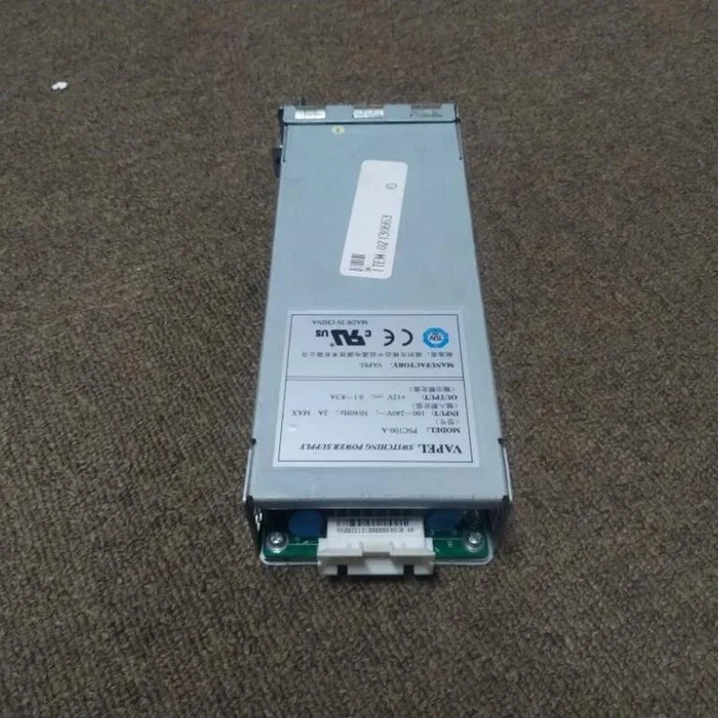 Rectangular ATX power supply unit, matte black finish, cooling fan visible, branded KHACHIMO