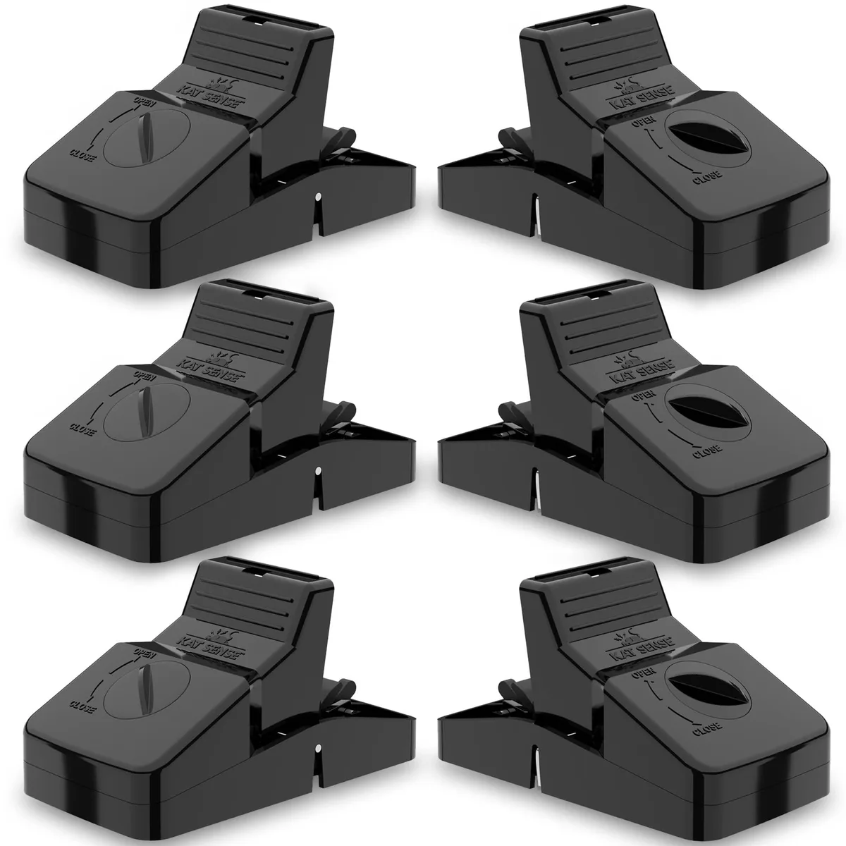 Six large plastic snap traps, light grey with yellow triggers and removable bait cups, arranged on a flat surface