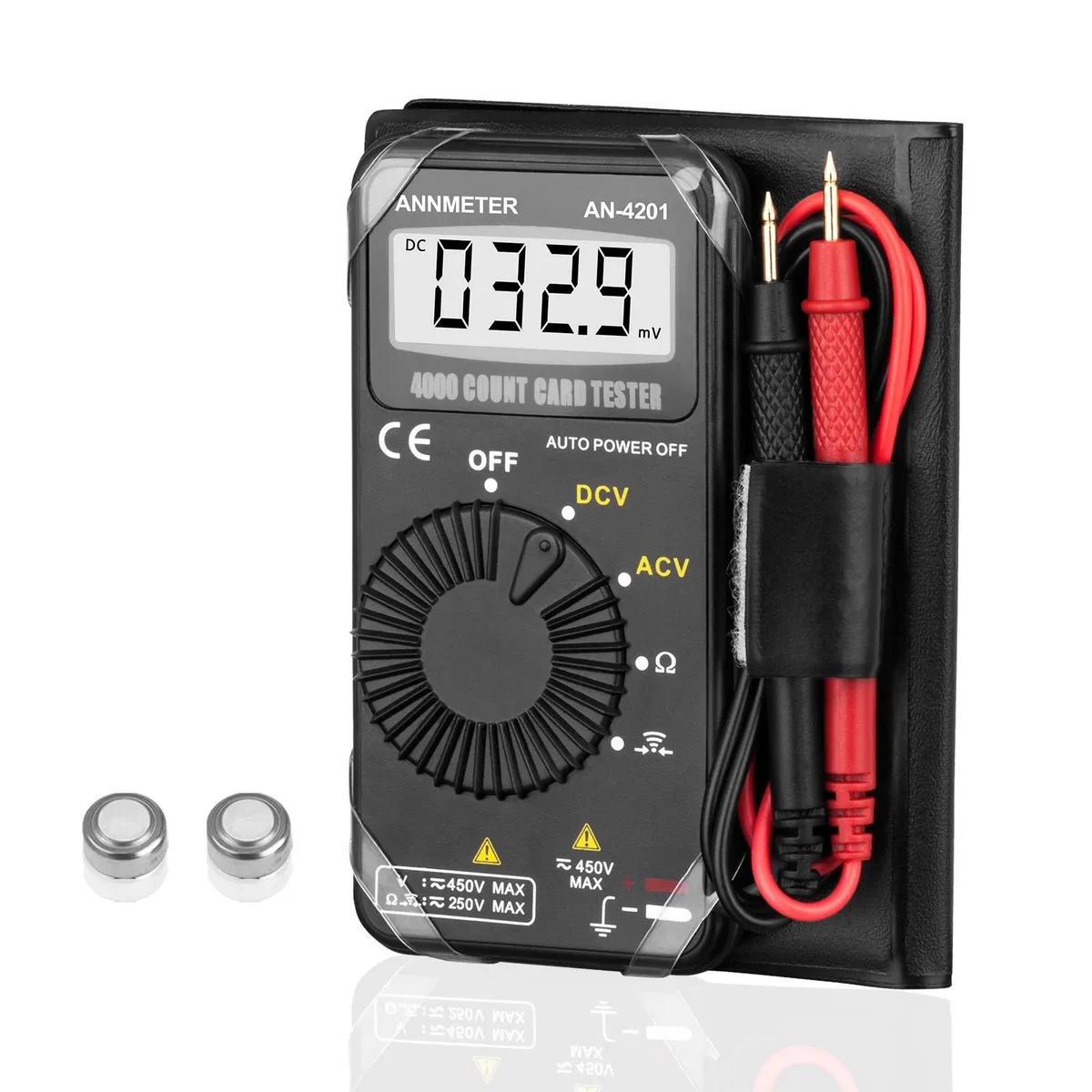 Compact digital multimeter in leather case with test leads