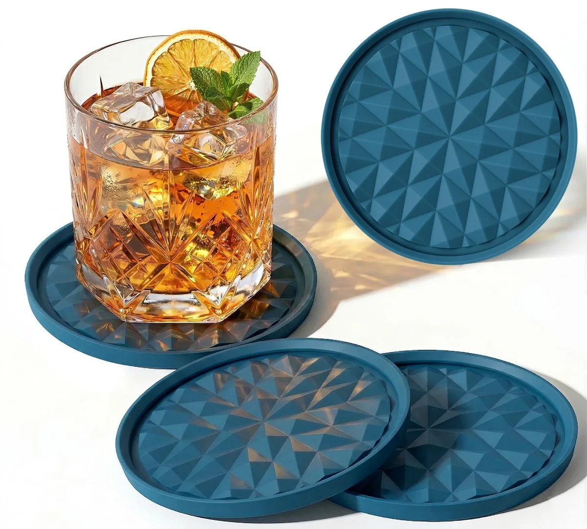 Four dark-blue round silicone coasters with diamond pattern, 3.9 in diameter