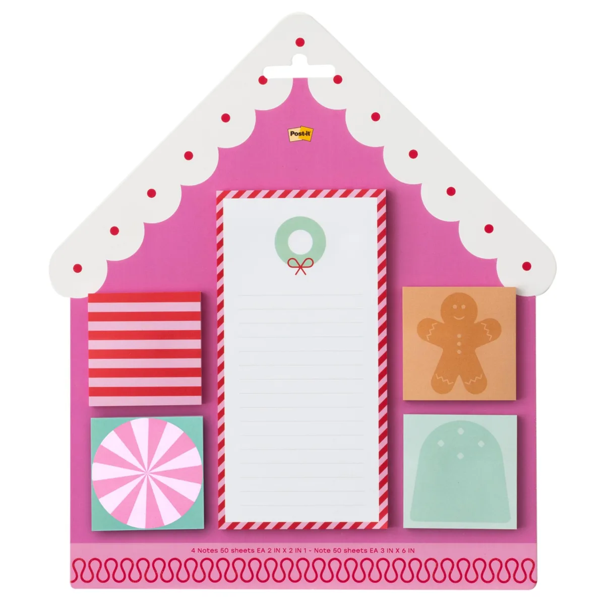 A gingerbread-house box holding five assorted sticky-note pads, four small squares and one larger rectangular list pad
