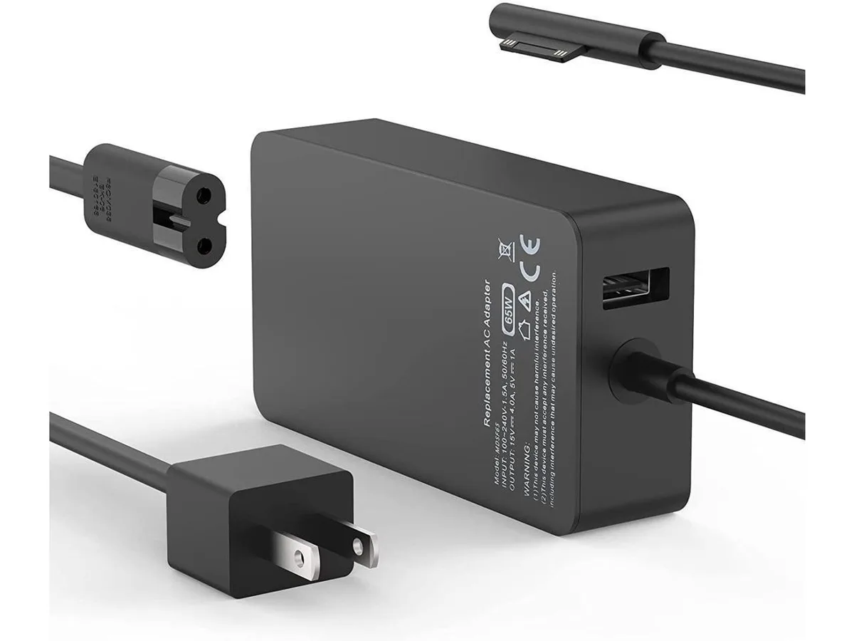 Black rectangular 65W power adapter with detachable cables