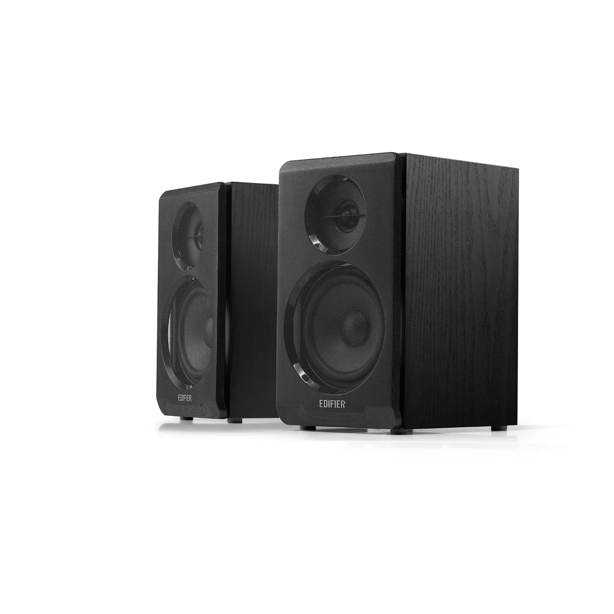 A pair of black bookshelf speakers with wooden cabinets and top-mounted controls on the main unit