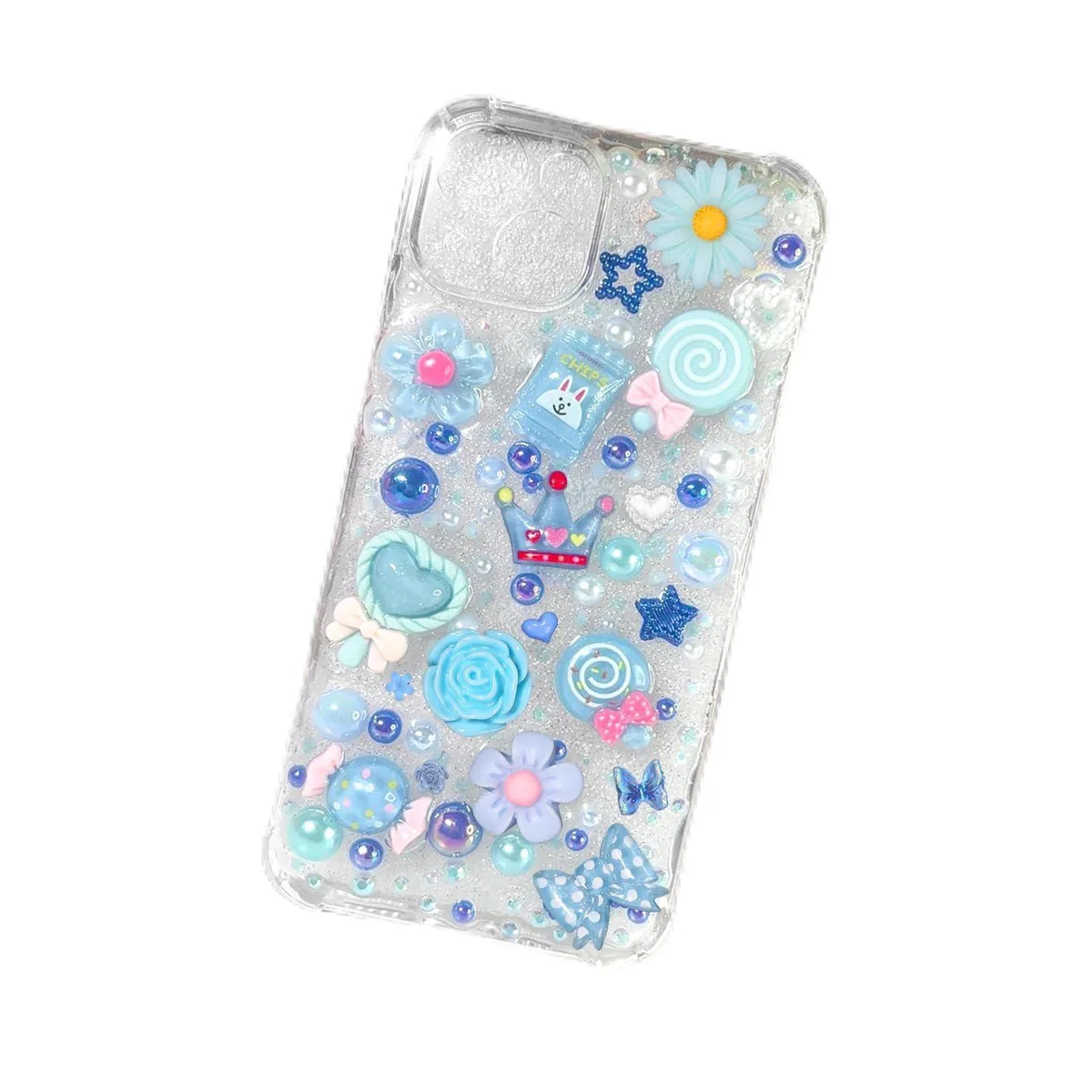 Clear box holding 330 tiny resin charms in mixed candy, animal and symbol shapes, glossy multi-colour finish