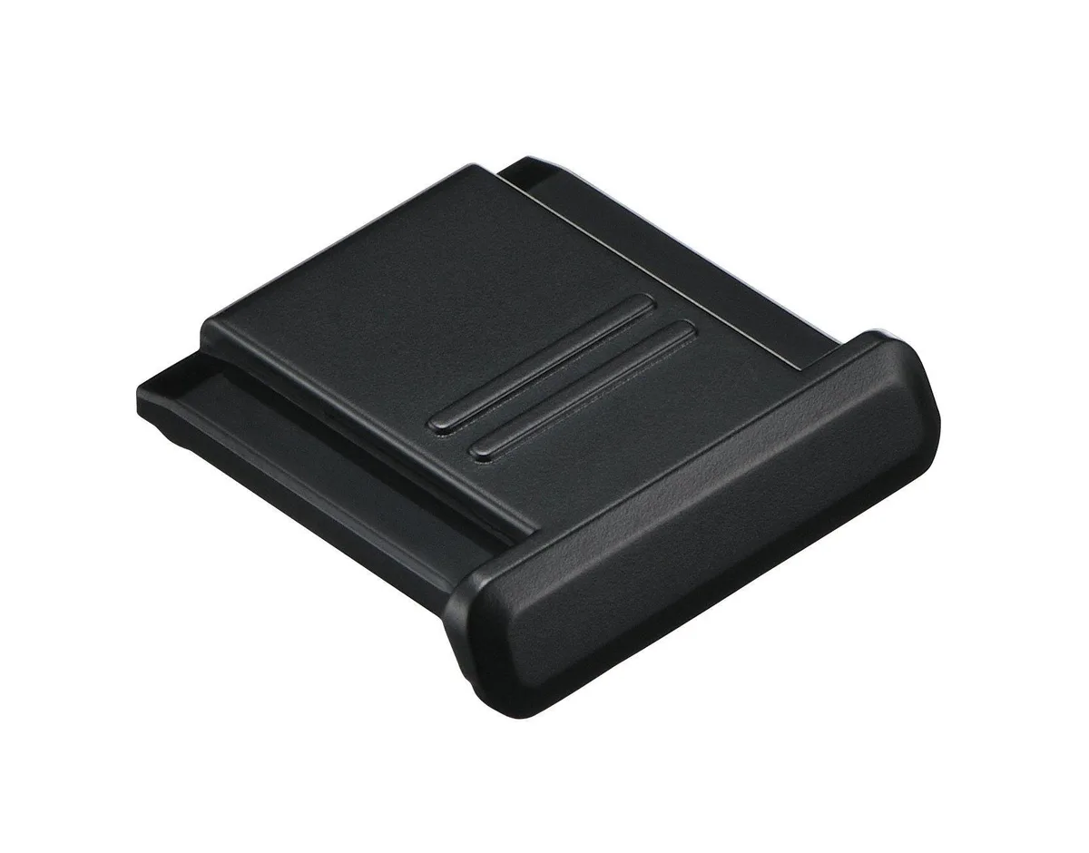 Small black plastic hot-shoe cover for Nikon cameras