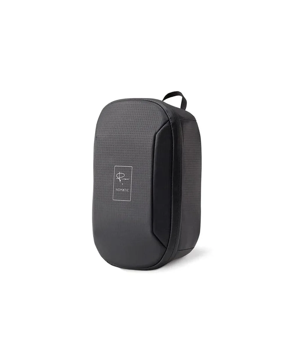 Rectangular camera tech organizer in dark fabric with zip closure, hanging loop and back strap
