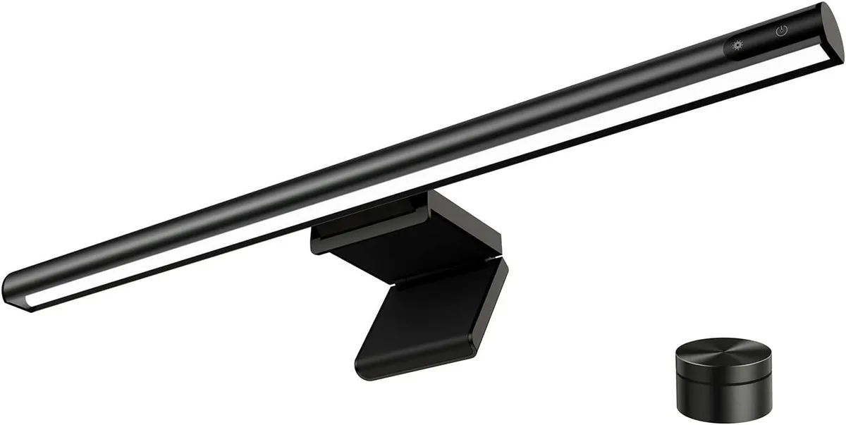 A slim metal LED bar on a gravity damper bracket with a small remote control