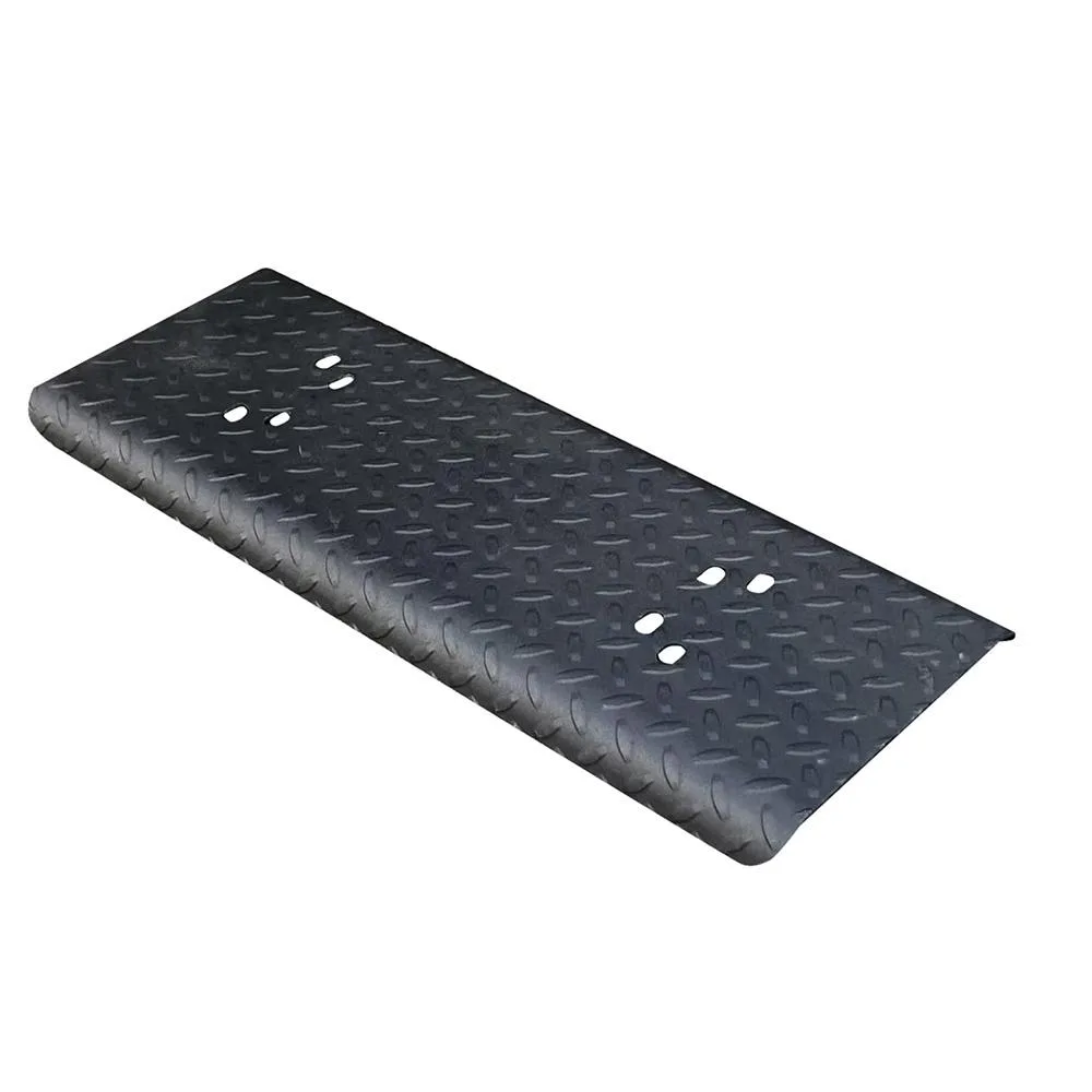 Black rectangular step pad with textured surface and mounting hardware visible