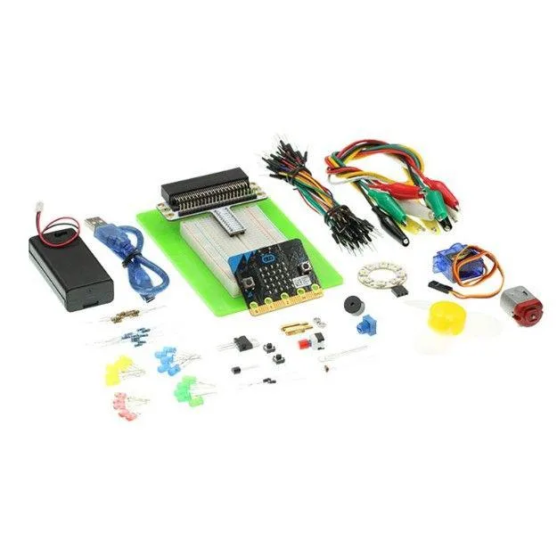 Open educational kit box showing micro:bit board, breadboard, components and cables