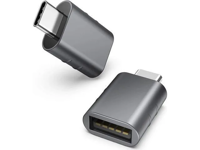 Two compact space-grey USB-C to USB 3.0 adapters side by side