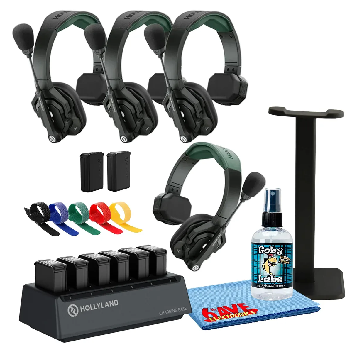 Four single-ear wireless headsets with boom microphones, charging case and accessories, matte black finish