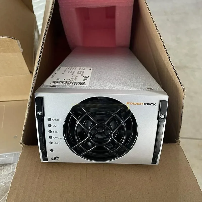 Rectangular ATX power supply unit in metal casing with ventilation grille and label showing 48 5800 241246.500