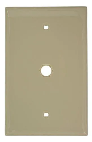 Ivory nylon midway wall plate, hexagonal opening, 4.88 by 3.13 inches