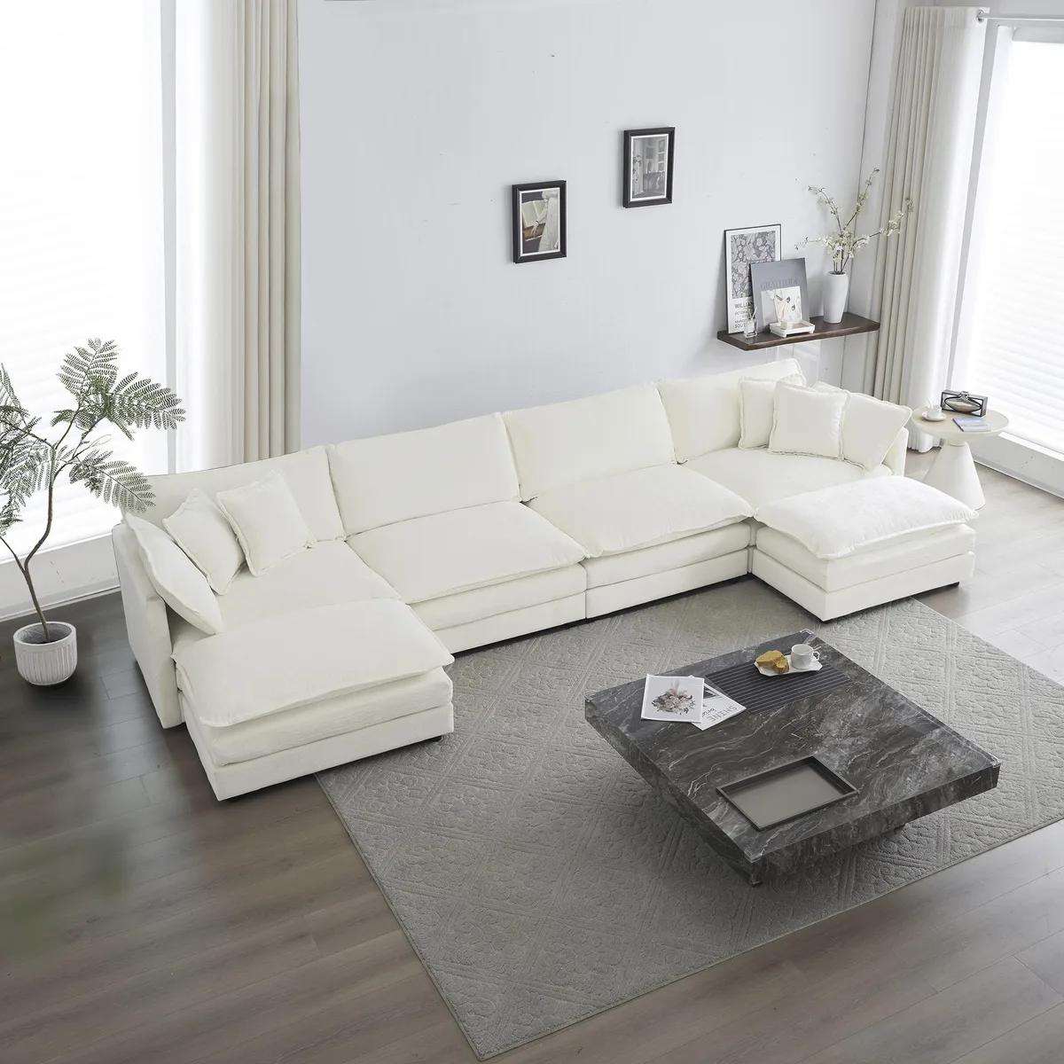 White chenille U-shaped sectional with reversible chaise and two ottomans