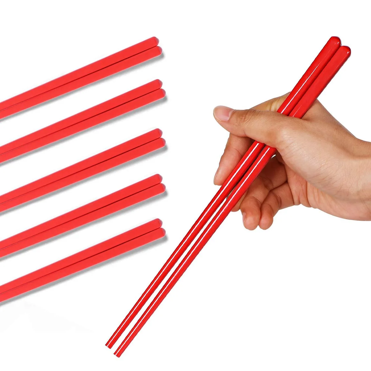 Fifteen red ceramic chopsticks with smooth glossy finish laid together