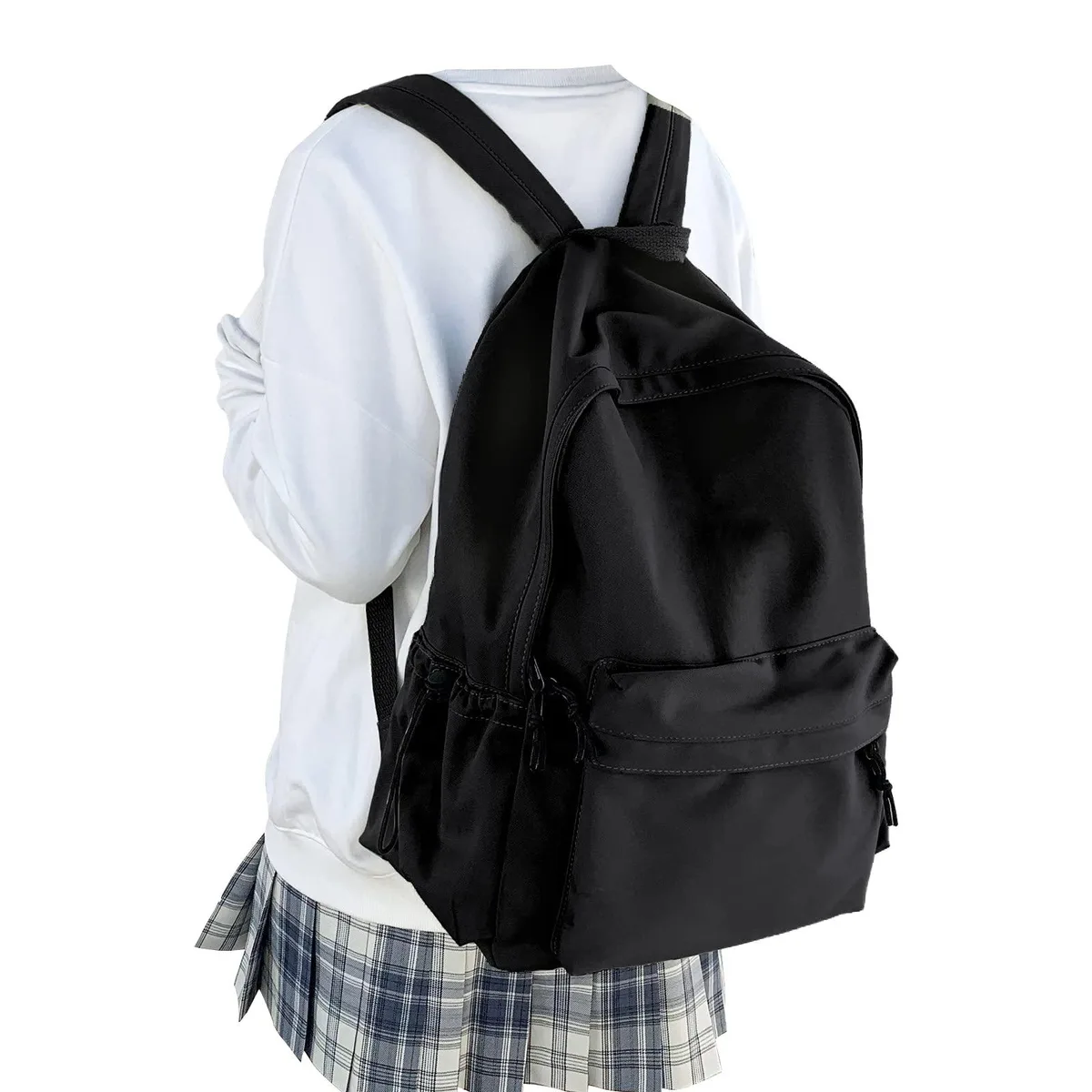Black nylon daypack with padded back panel, adjustable shoulder straps, front zip pocket and side mesh pockets