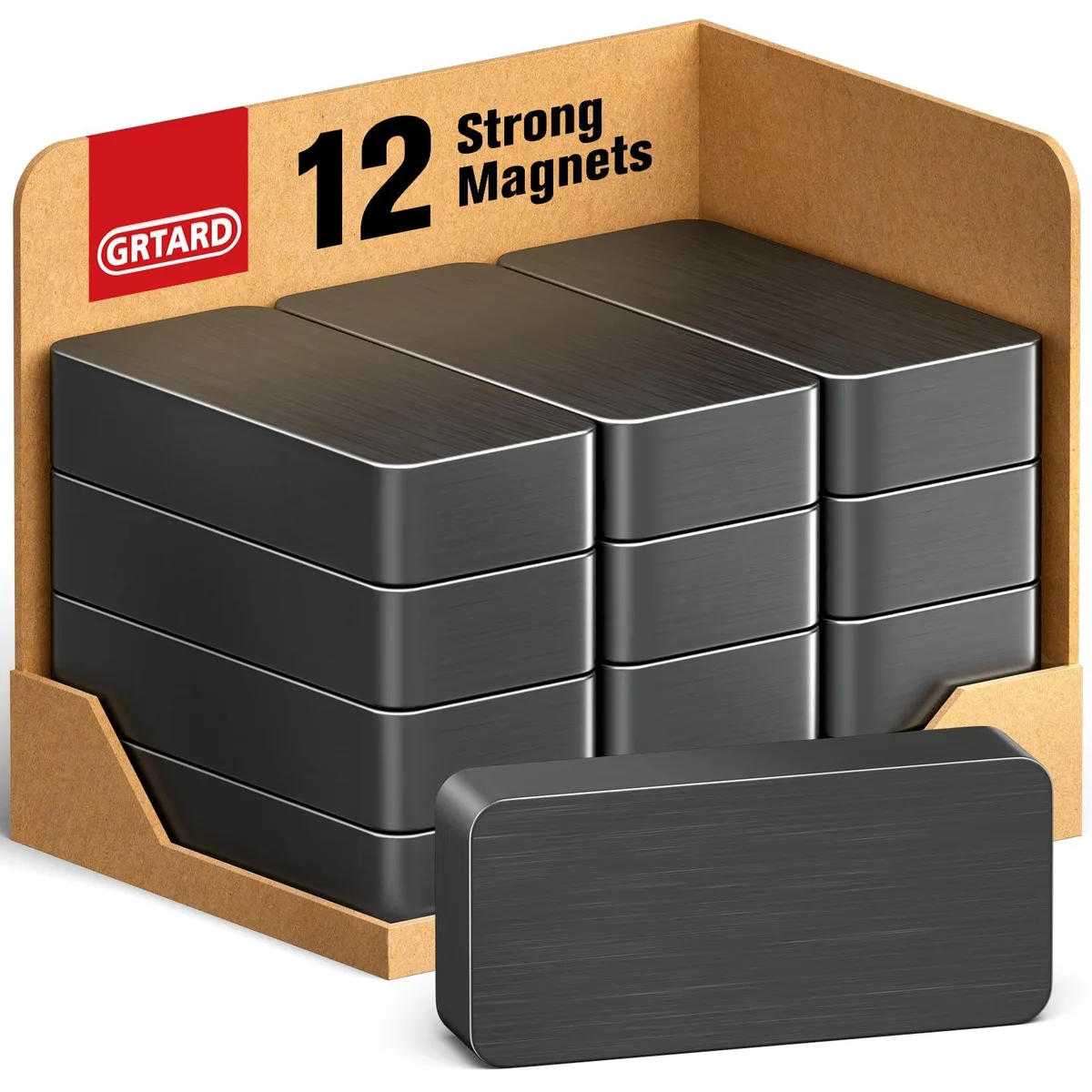 Twelve black rectangular ceramic magnets in a pack
