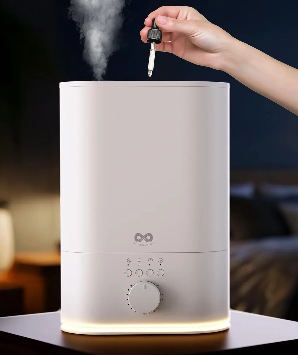 White ultrasonic humidifier, tall oval shape, top-fill tank, 360-degree mist nozzle