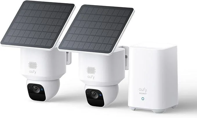 Two white wireless outdoor cameras with solar panels and pan-tilt mounts