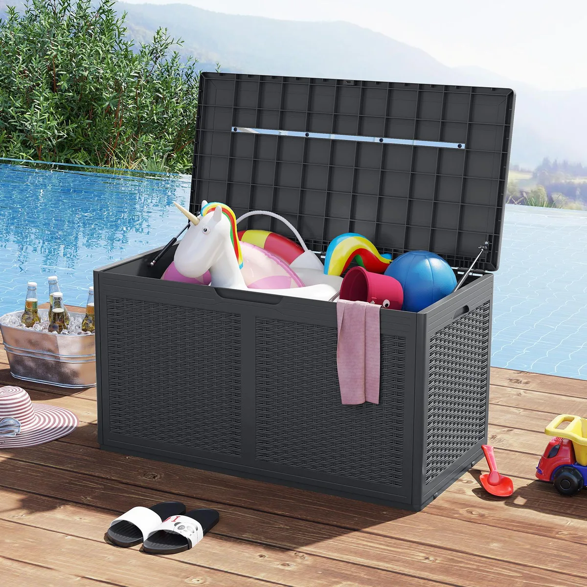 Grey resin deck box with rattan texture, wheels and gas-strut lid
