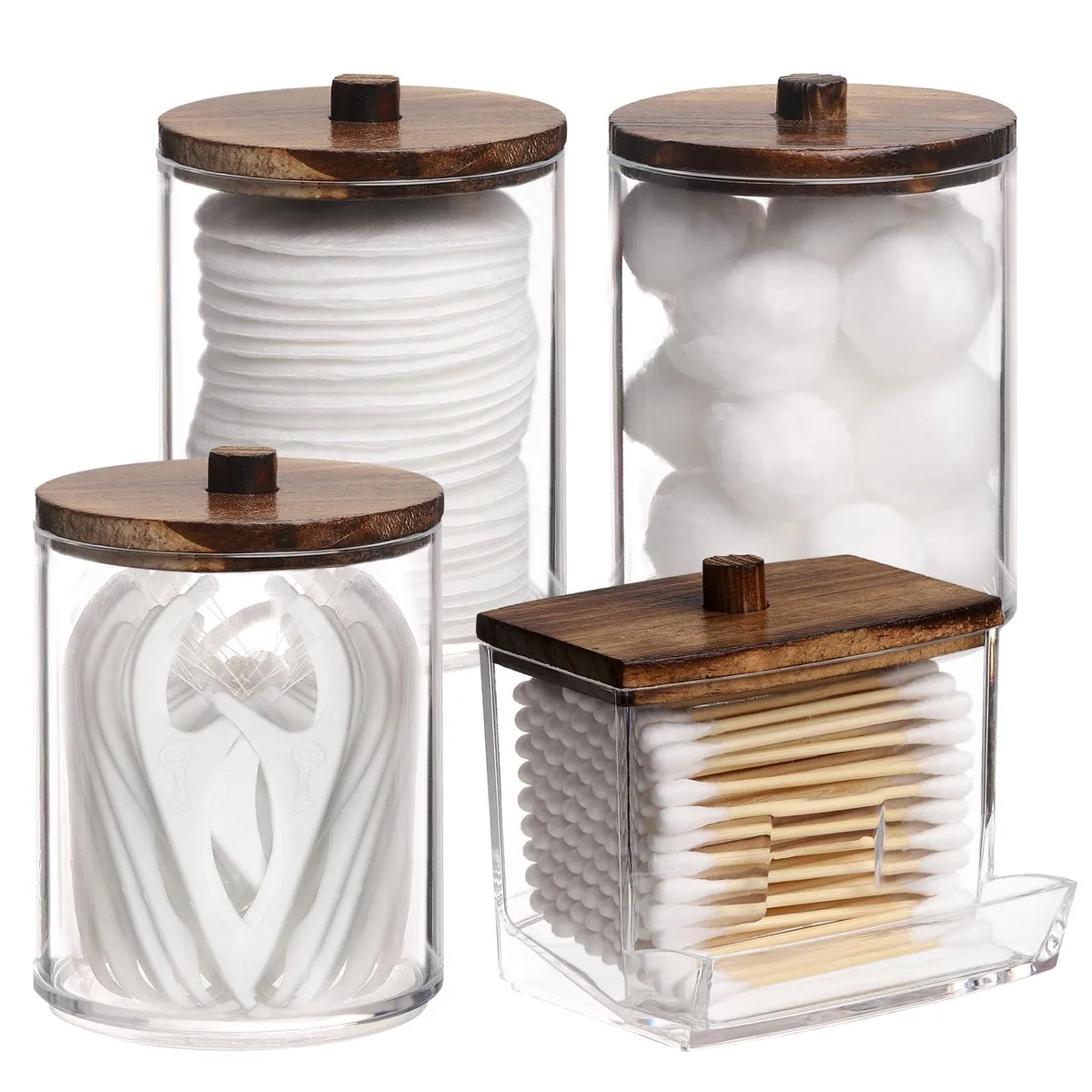Four clear plastic apothecary jars with brown bamboo lids