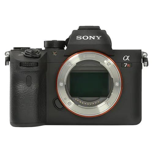 Black mirrorless camera body with 3-inch LCD screen