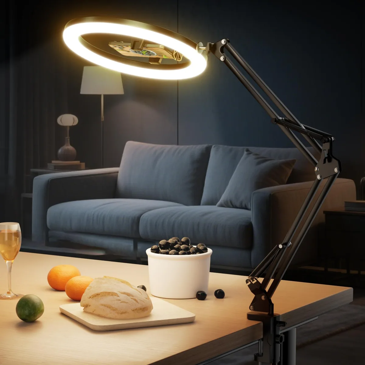 Black 12-inch ring light on adjustable desk clamp arm with phone mount