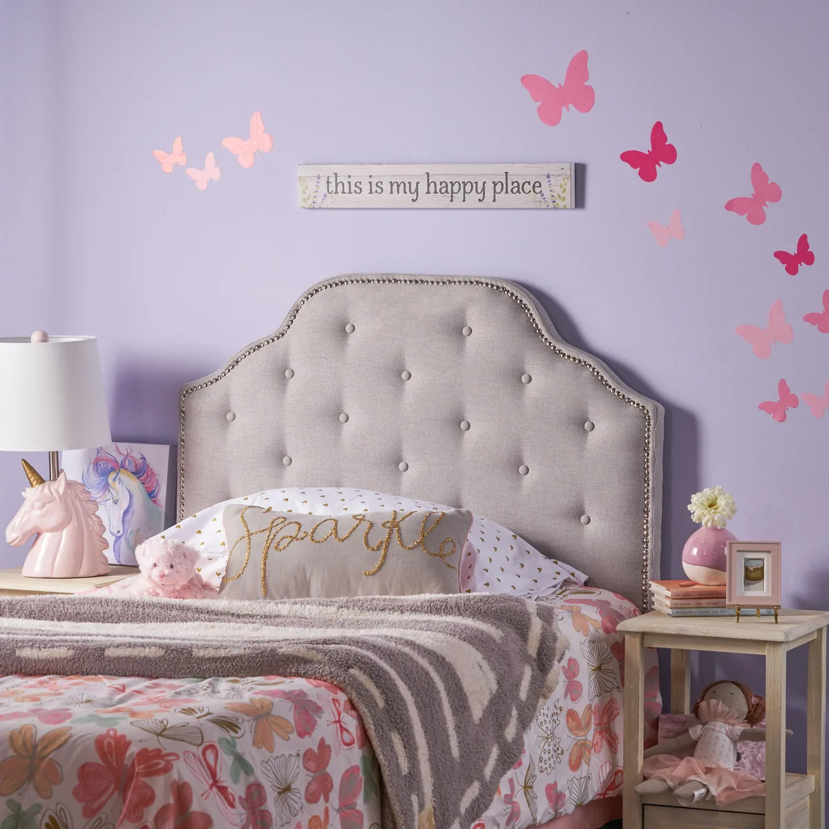 Light grey fabric twin headboard with button-tufted diamond stitching, nailhead trim, camelback shape, metal legs