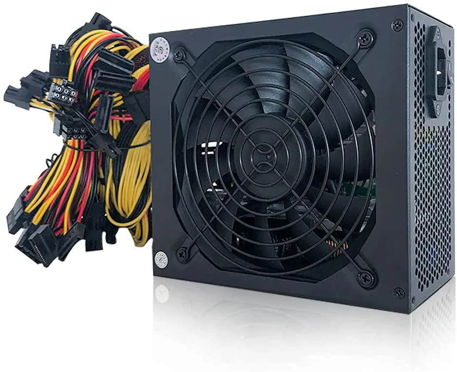 Rectangular silver power supply unit with modular cable sockets and ventilation grille