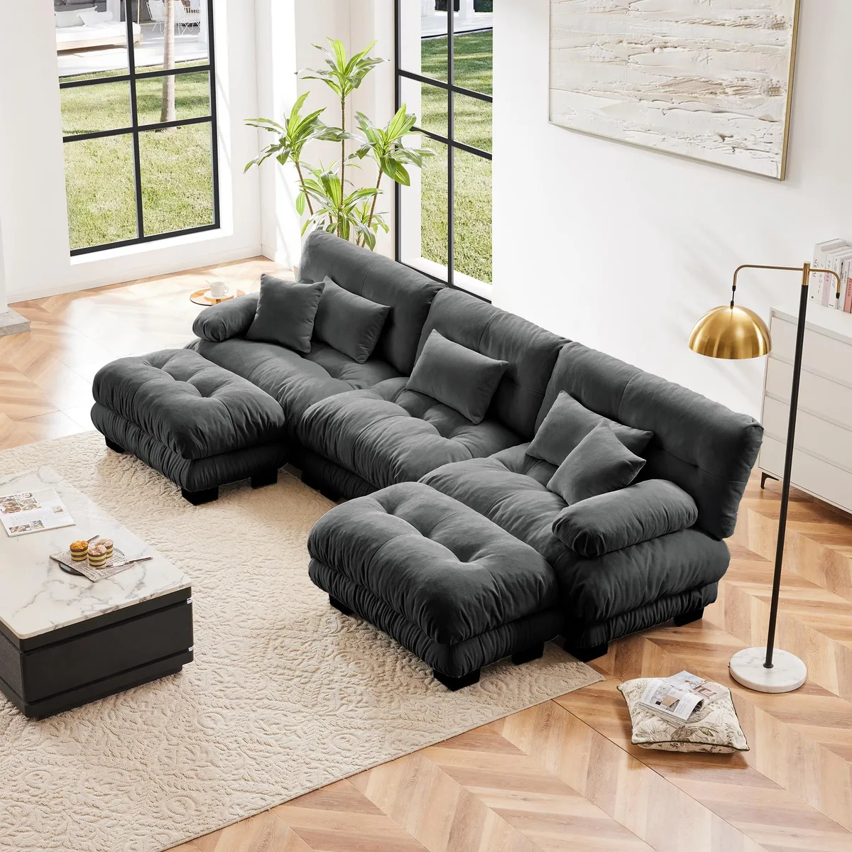 Large gray U-shaped chenille sectional sofa with two matching ottomans and round bolster armrests