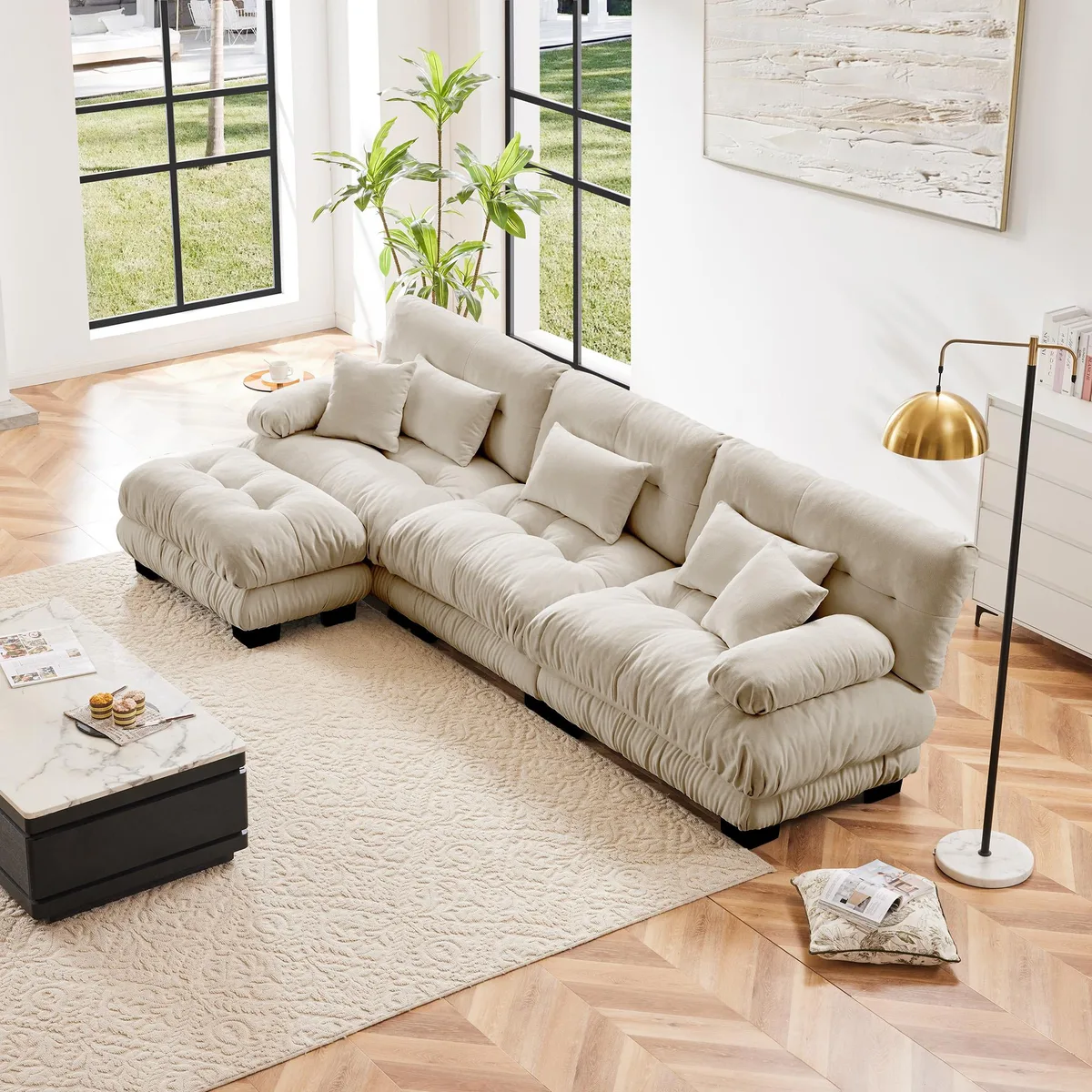 Oversized L-shaped modular sofa in light coffee chenille with convertible ottoman and round bolster armrests