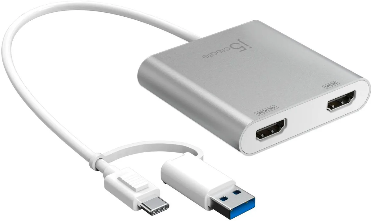Silver USB-C adapter with dual HDMI ports and attached Type-A adapter