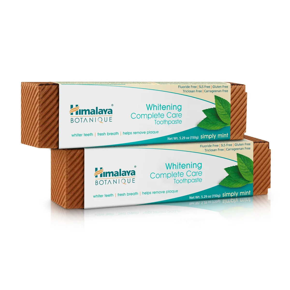 Two white tubes with green caps and mint leaf graphics on a plain background