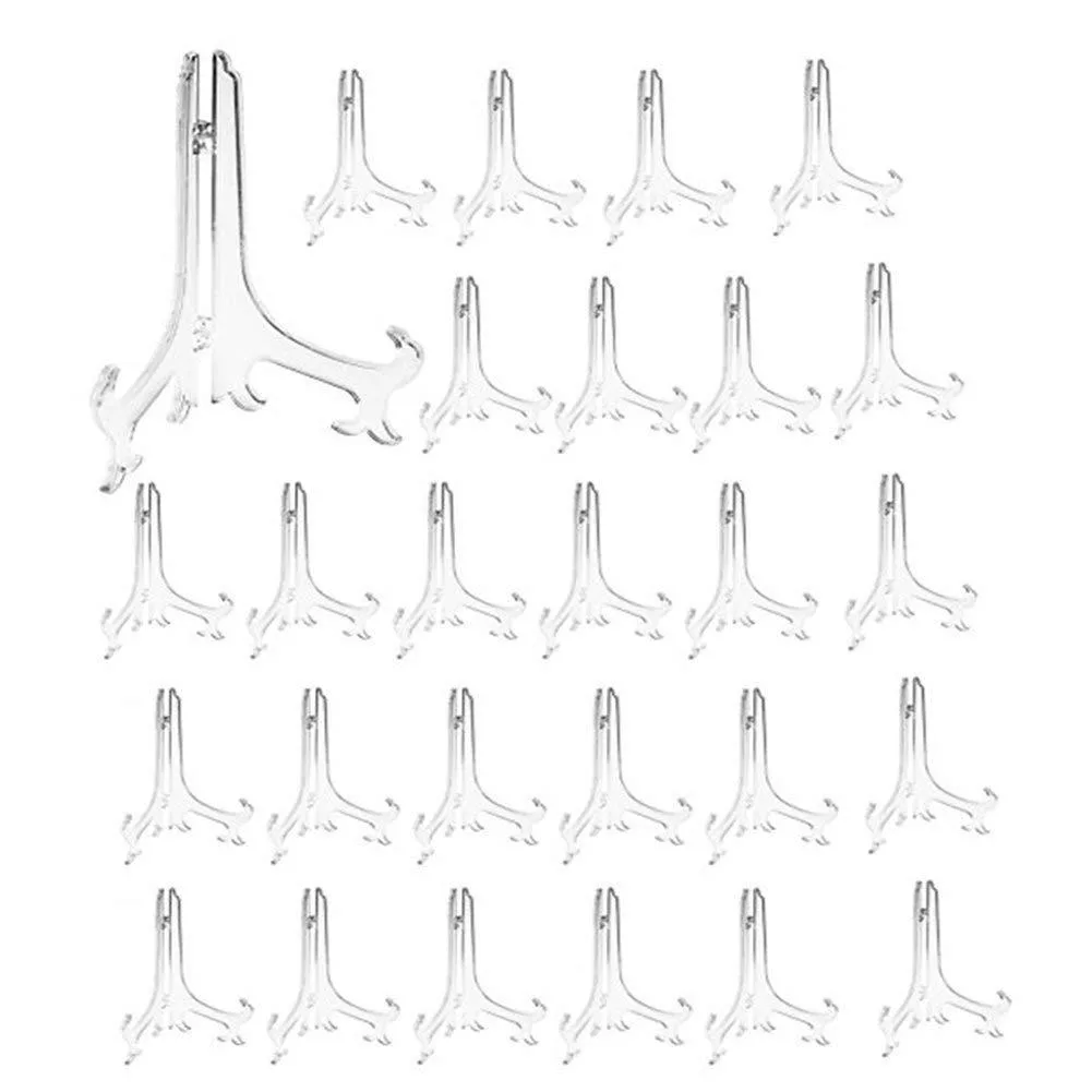 Twenty-four small black plastic tabletop easels folded flat in a pack